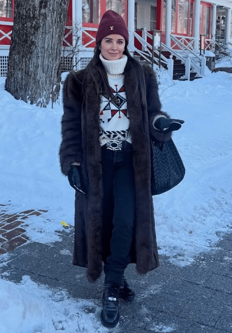 Kyle Richards Ivory Printed Turtleneck Sweater and opulent mid length faux fur coat combining two types of fur. It features a stand collar and princess sleeves leaning into the 90’s power shoulders silhouette. Side seam pockets and front hook fastenings make for a sleek finish.