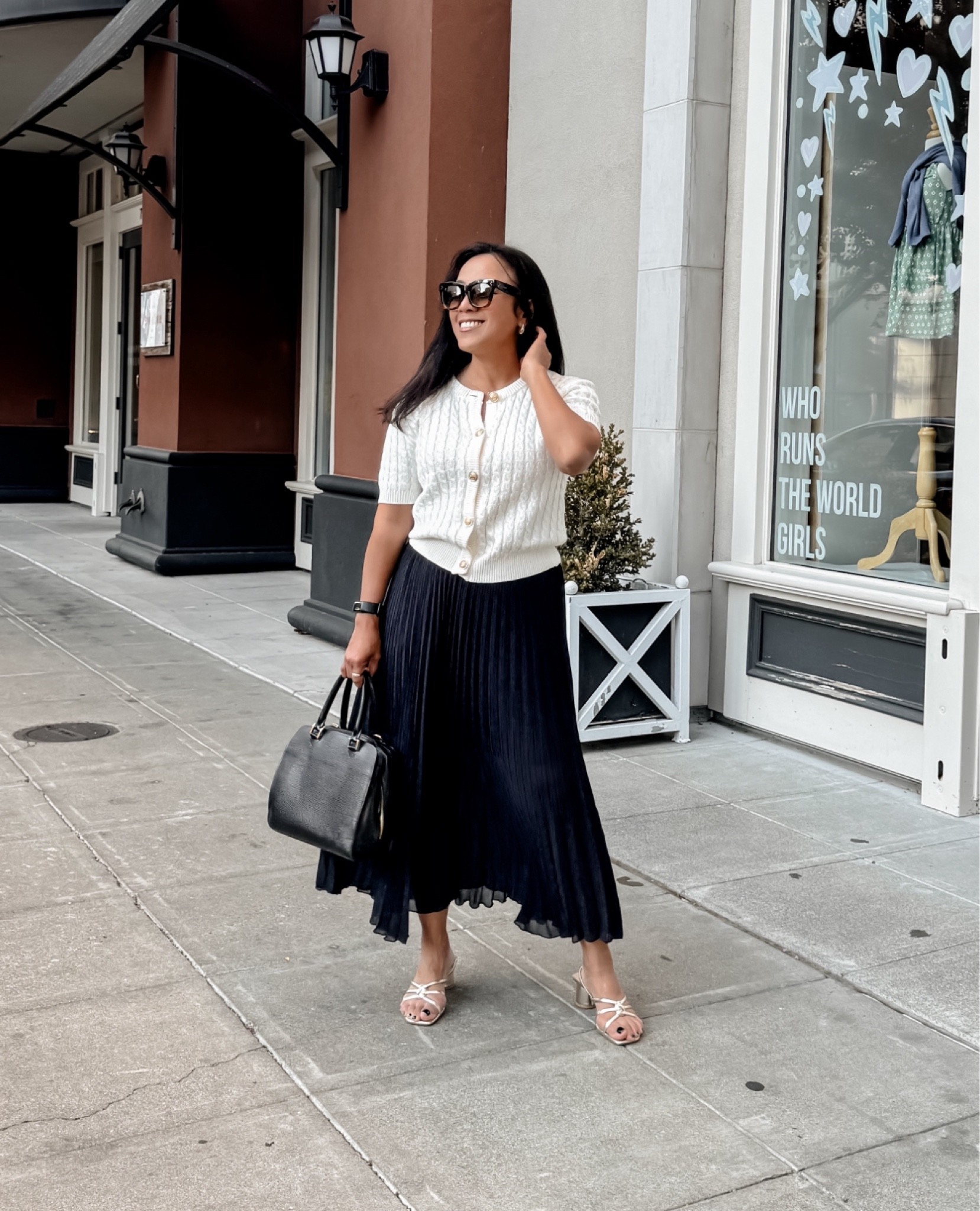 Old money style 
Short sleeve cable knit cardigan // pleated skirt // gold sandals // vintage epi louis vuitton

#LTKSaleAlert #LTKStyleTip #LTKFindsUnder50