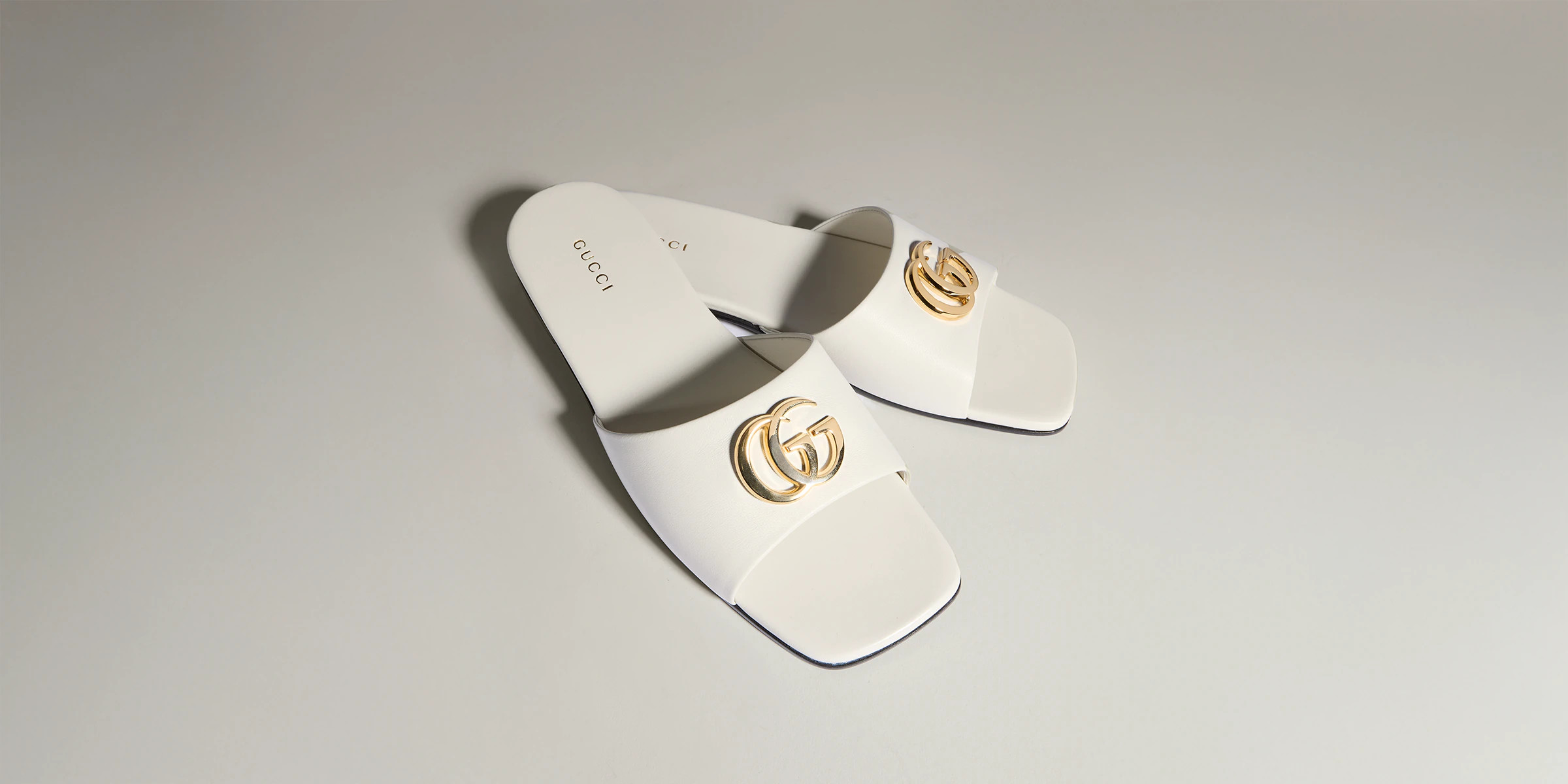 Gucci - Women's slide sandal with Double G | Gucci (UK)