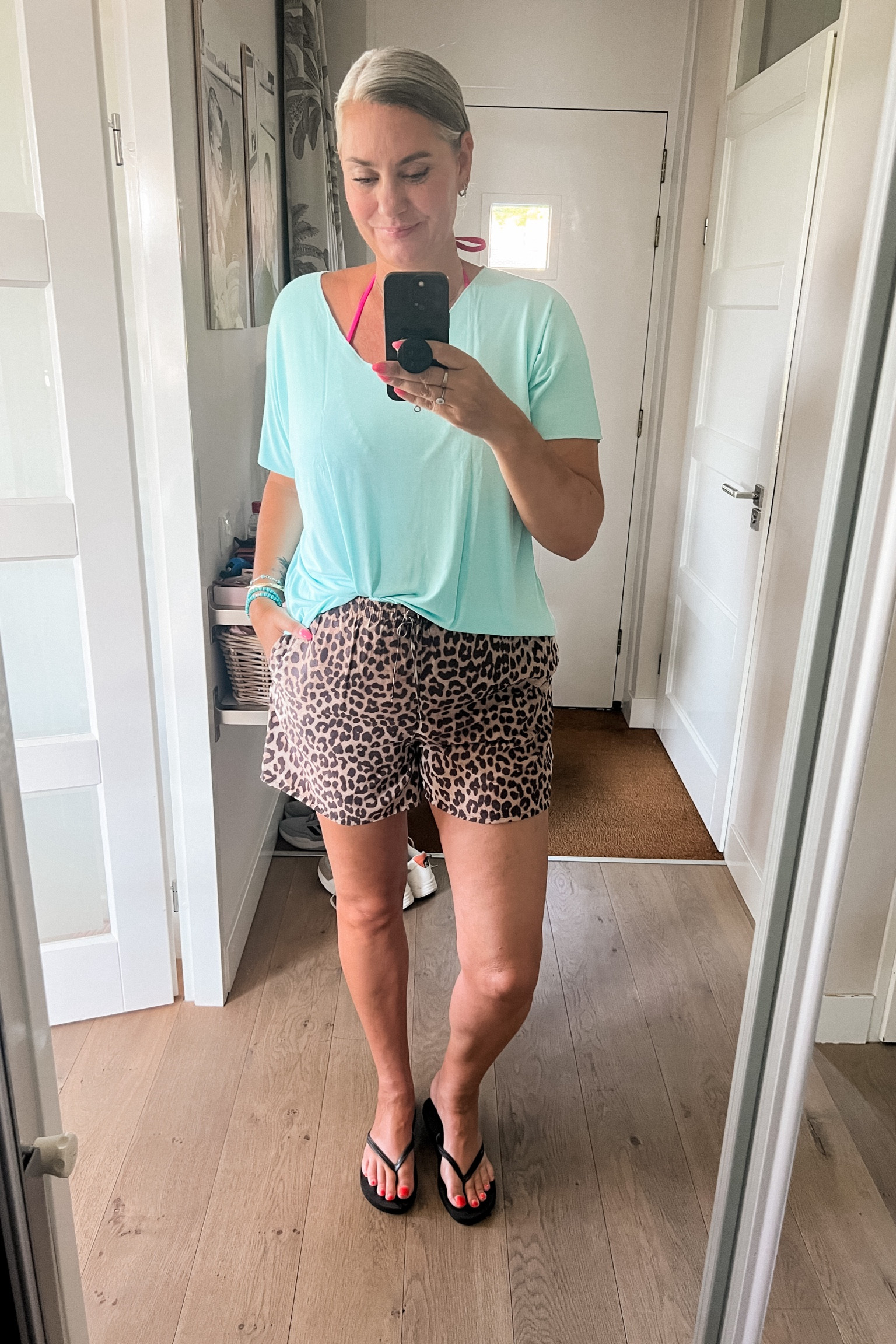 Ootd - Saturday and ready for our first sup session of this summer! Bright colored bikini, oversized turquoise t-shirt paired with leopard shorts and flip flops. 

#LTKeurope #LTKsummer #LTKswimwear