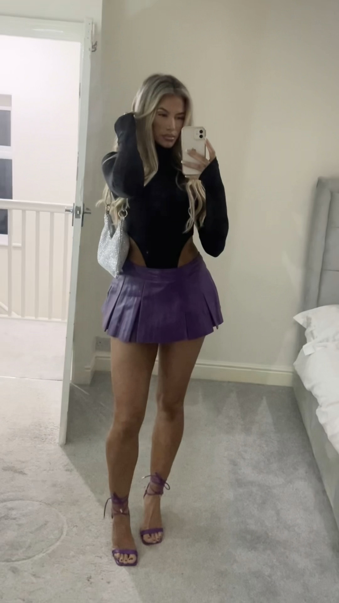 Shop the cutest mini skirt I’ve ever worn! It’s short but it has built in panties 🫶🏽💜 and the body suit is a PERFECT fit so comfy girlies… this gives party season ready 🎄

#LTKHoliday #LTKparties