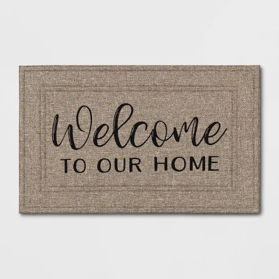 1'6"x2'6" "Welcome to Our Home" Mat Tan - Apache Mills | Target