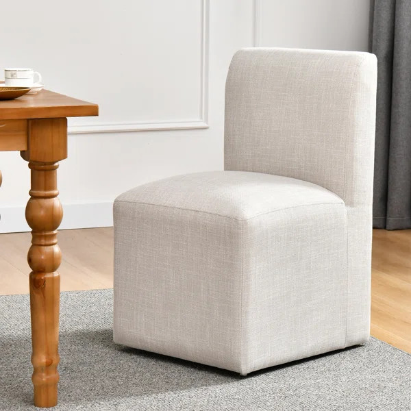 Ritney Down Fill Modern Dining Chairs Casters Parsons Chair | Wayfair North America