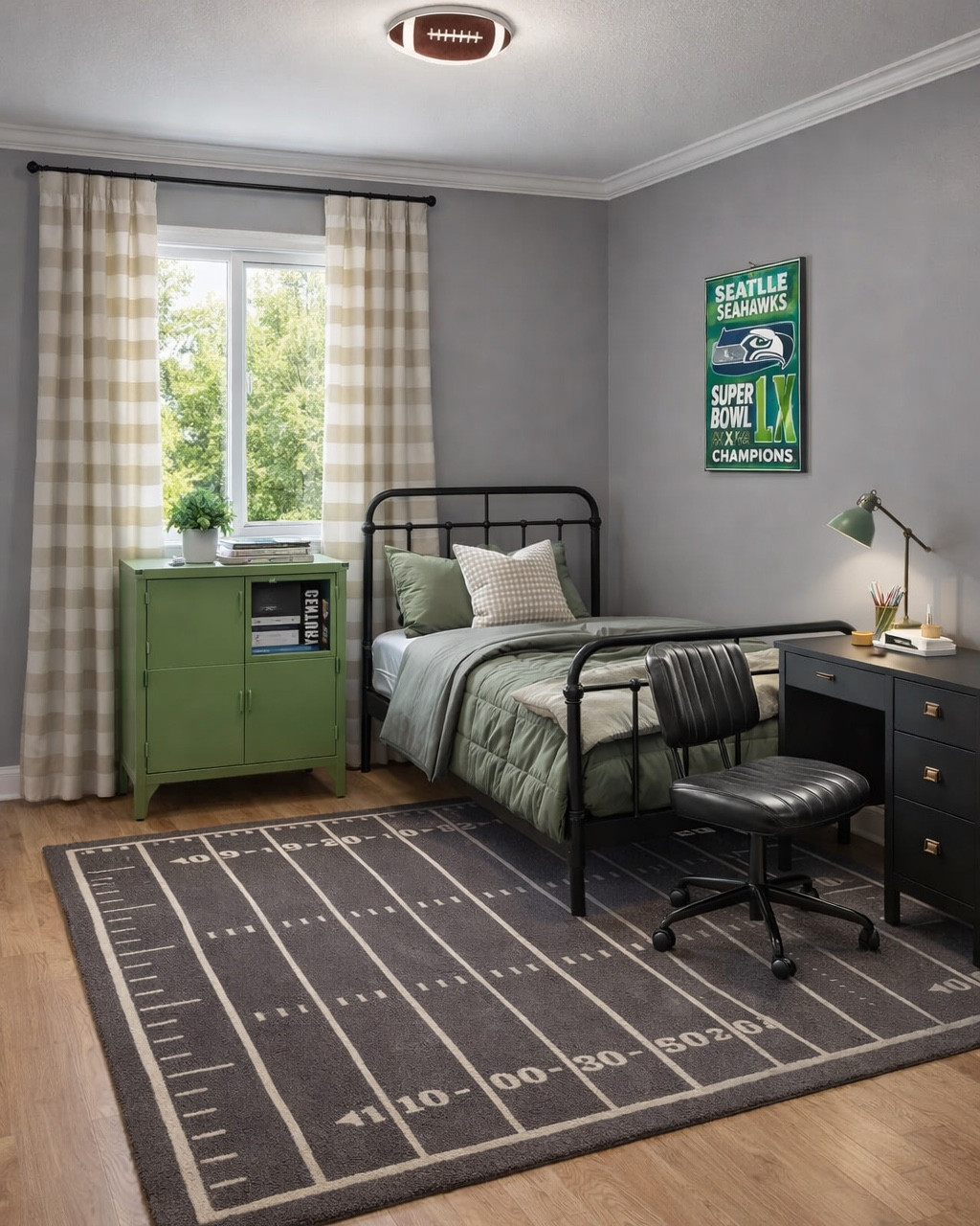 @Wayfair Teen bedroom ideas! Teen bedroom mood board. Seahawks fan. Football-inspired boy’s room. Green cabinet, metal bed, black desk and faux leather chair, wool rug. Affordable Amazon art. 

#LTKKids #LTKHome #LTKSeasonal