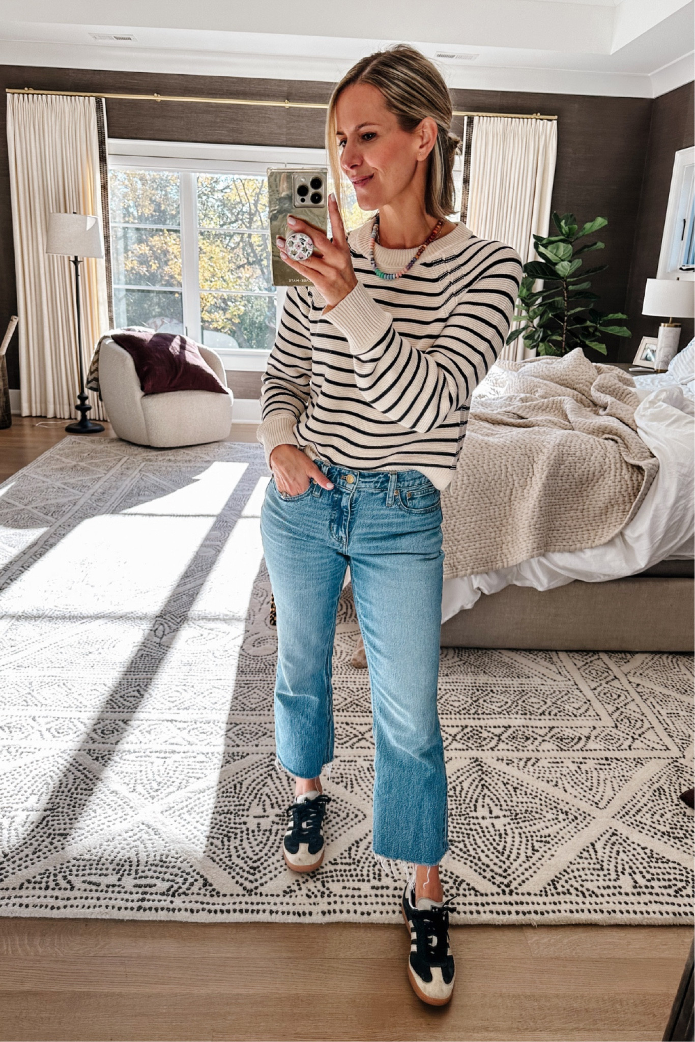 So many stripes. My exact sweater is sold out, but I’ve linked similar below.

#LTKStyleTip #LTKSeasonal