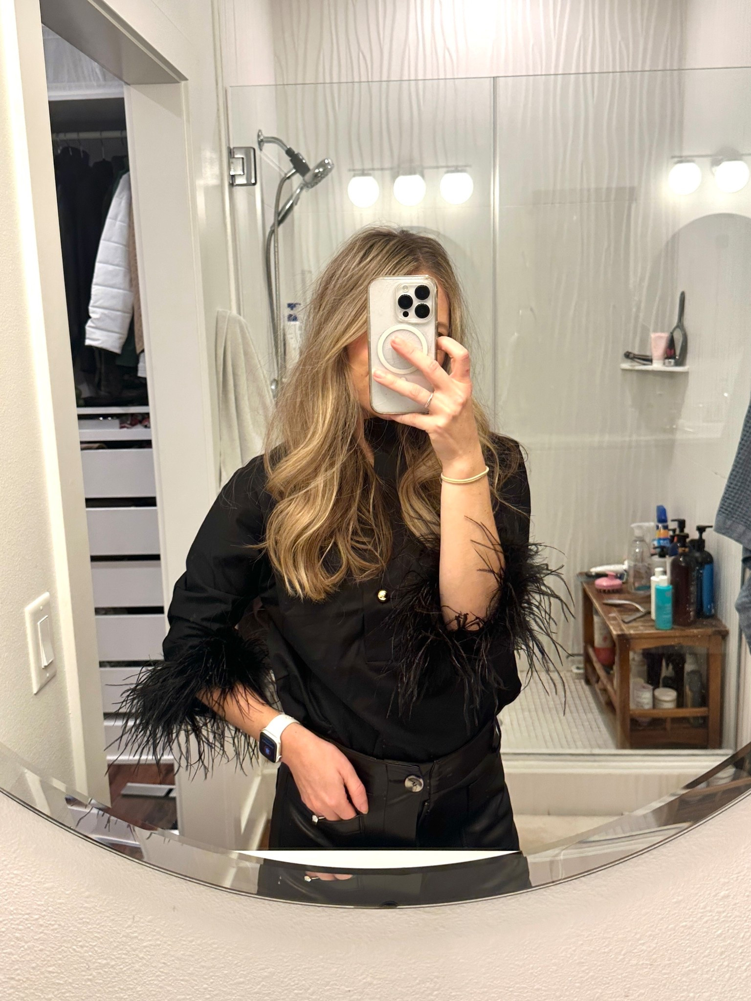 This feathered top is the easiest, most classic and timeless holiday party outfit. I paired with black leather pants but equally as cute with a statement skirt or patterned pants. Love that is has a good amount of structure! I’m in an XXS and feel that it fits TTS/size down if you’re between sizes. It’s long if you’re petite like me but totally tuckable! 

#LTKSeasonal #LTKHoliday #LTKPetite