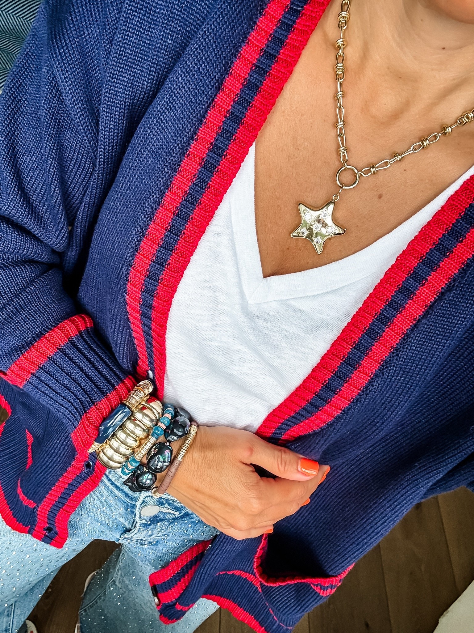 All jewelry now $5 to $40. Small cardigan. XS white V-neck T-shirt. Star necklace. Beaded bracelets. Bracelet stack.

#LTKSaleAlert #LTKOver40