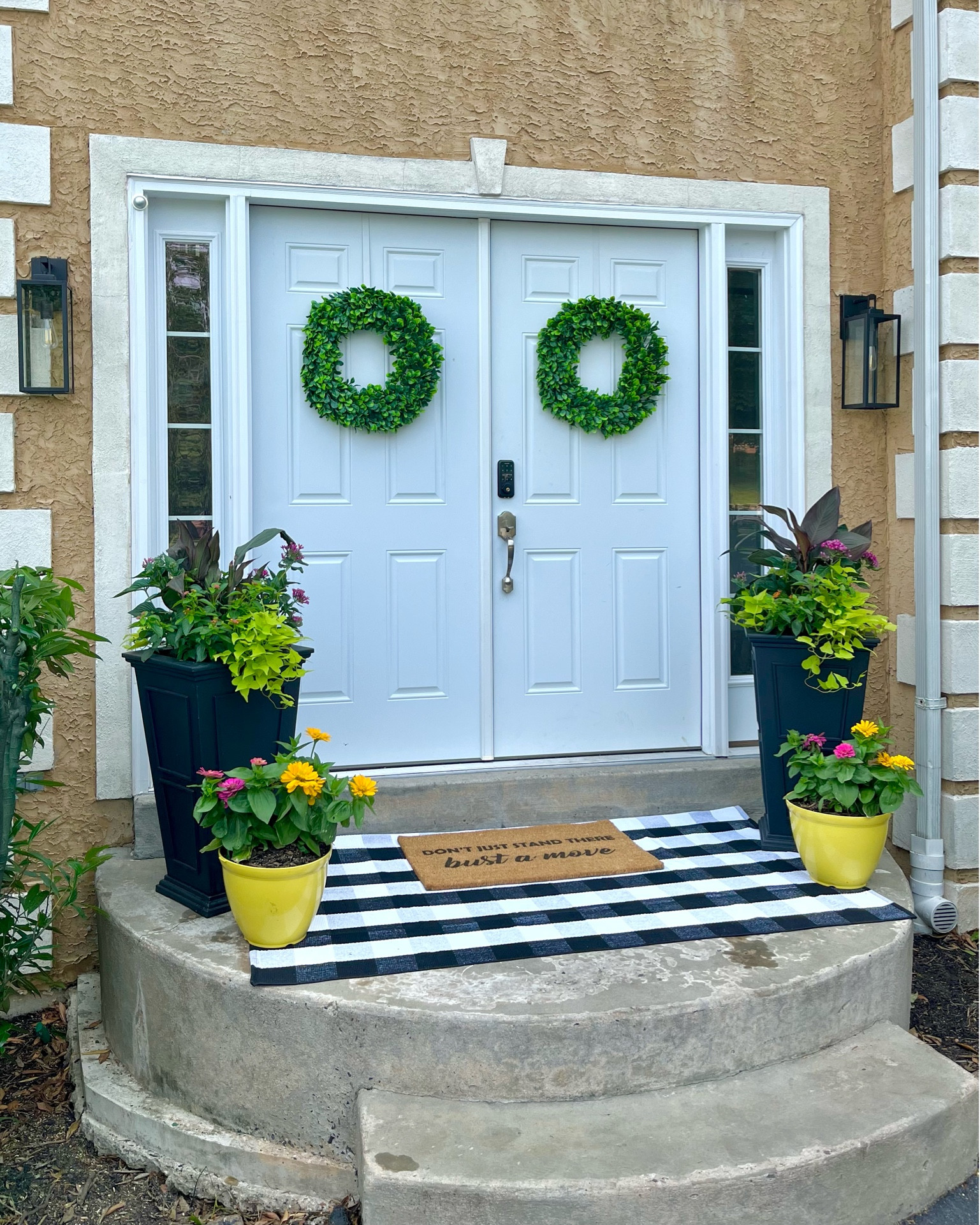 My happy little front door! Bring on the flowers and sun!
Especially cannot recommend these tall black planters anymore! They have a self watering reservoir, so when I go away for the weekend, my plants don't get all crispy. Absolutely recommend ! 

Front door, planters, buffalo check rug, welcome mat, self watering, boxwood, lighting, outdoor lighting, security lighting, flowers, wayfair 



#LTKSeasonal #LTKfindsunder100 #LTKhome