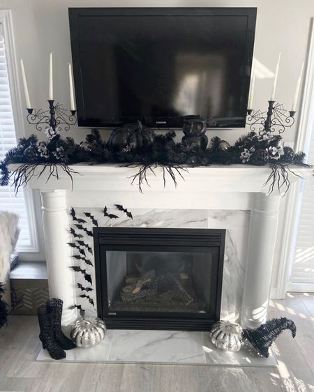 Fireplace Halloween decor mantel ideas 
#BlackandWhiteHalloweenDecor 

#LTKHoliday #LTKSeasonal #LTKHalloween