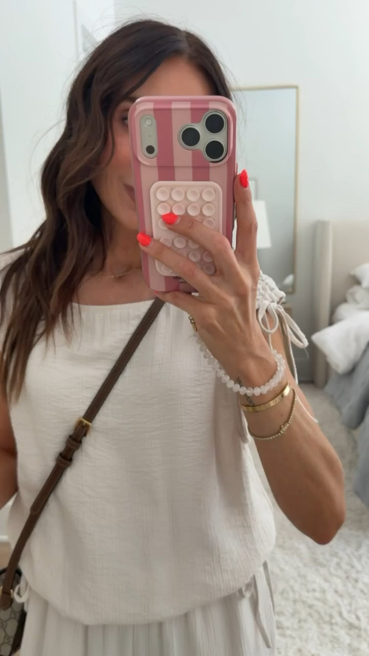This lightweight matching set is exactly what I want to wear on warm days when I still want to feel put together. The tie shoulder top and flowy wide leg pants make the prettiest combination, and both pieces can easily be styled separately.

matching set, white matching set, wide leg pants, tie shoulder top, lightweight outfit, summer outfit, travel outfit, casual set, neutral outfit, petite style, vacation outfit, annabrstyle

#LTKootd #LTKSeasonal #LTKOver40