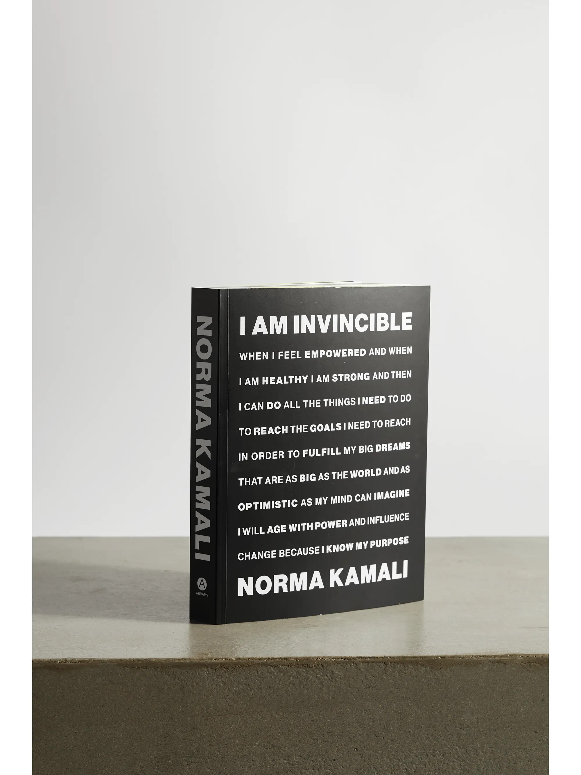 Black I Am Invincible by Norma Kamali paperback book | Abrams | NET-A-PORTER | NET-A-PORTER (UK & EU)