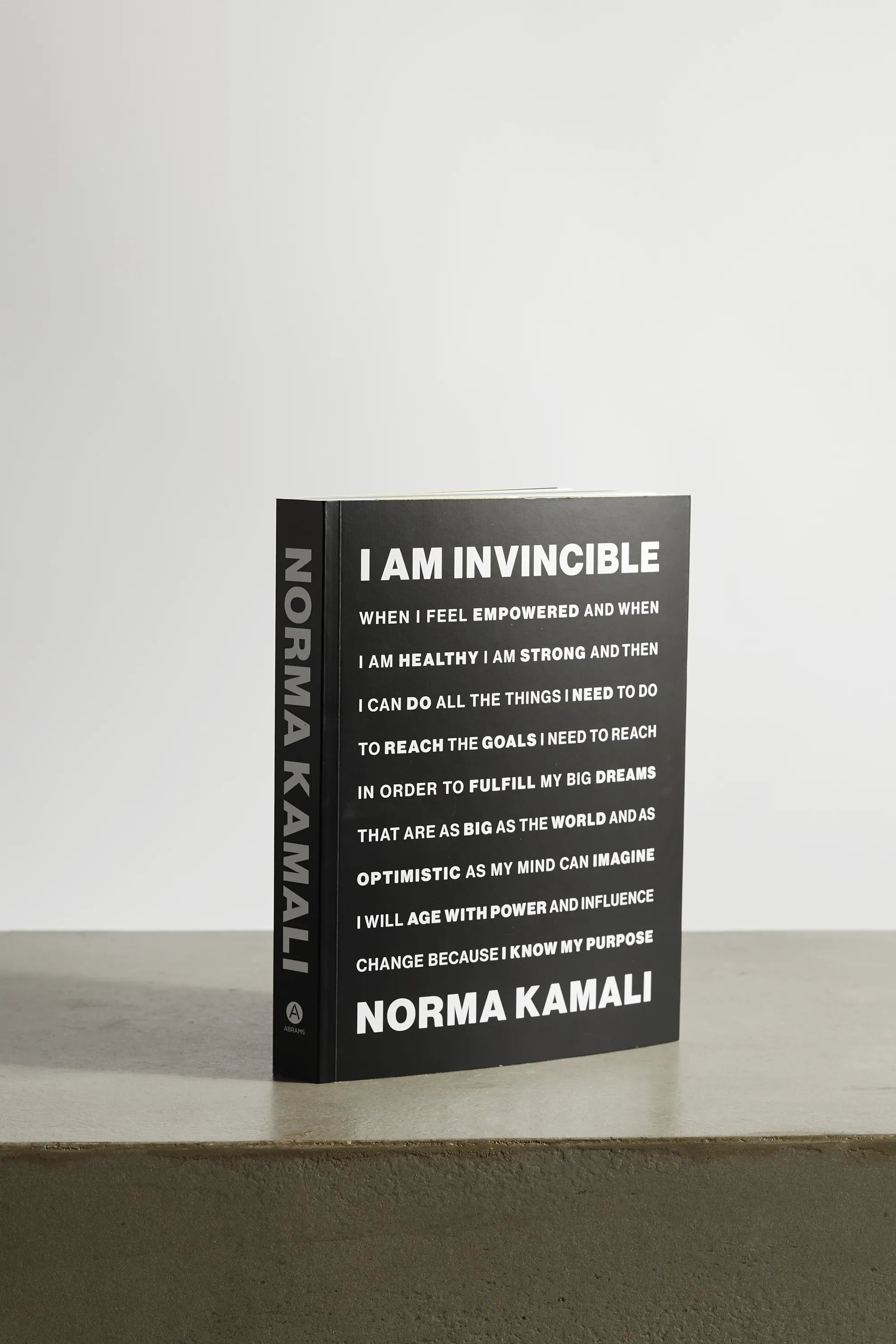 Black I Am Invincible by Norma Kamali paperback book | Abrams | NET-A-PORTER | NET-A-PORTER (UK & EU)