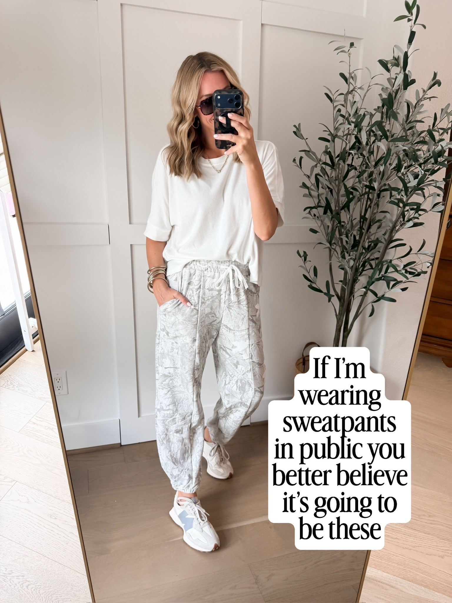 If I’m wearing sweatpants in public, they have to look this good. The subtle print makes these feel more styled than a basic jogger, while the drawstring waist and relaxed fit keep all the comfort. I’d wear them for errands, travel days, school drop off, or anywhere I want to be comfortable without looking like I stayed in pajamas.

printed sweatpants, women’s joggers, casual fall outfit, comfortable pants, elevated sweatpants, travel outfit, airport outfit, everyday casual style, drawstring pants, sneaker outfit, women over 40 style, HauteandHumid
