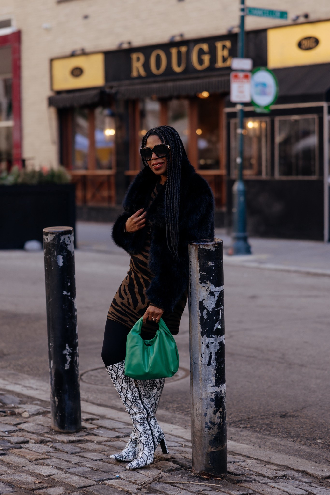 Urban edge with elevated texture. Faux fur coat, animal print dress, snake print boots, and a pop of green to break the neutrals. Confident winter street style. Shop the look.

#LTKootd #LTKU #LTKSeasonal
