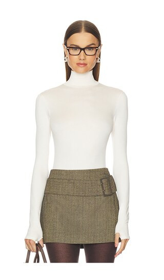 Commando Prima Ballet Turtleneck Bodysuit in Cream. | Revolve Clothing (Global)