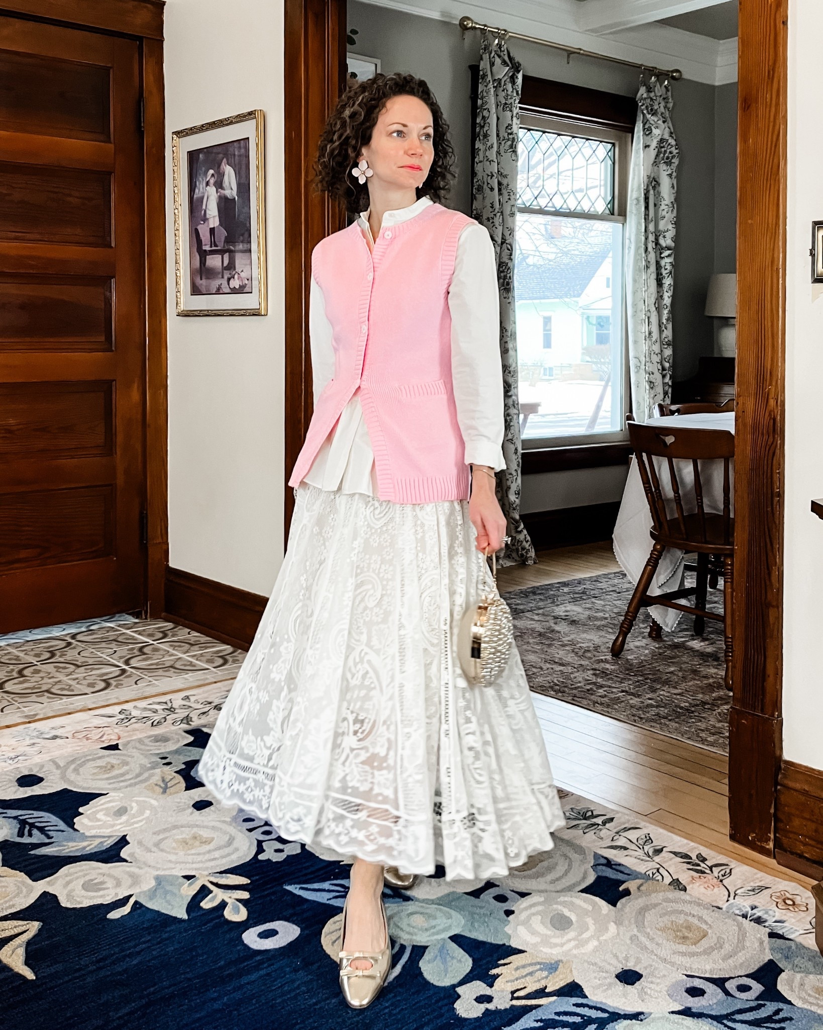 Sharing a recent skirt I got from Amazon!
Pink sweater vest is from a local boutique, linking similar. 
White button up is old from @jcrew , linking similar. 
Ivory lace skirt from Amazon. 
Large pink flower earrings are from a local boutique, linking similar. 
Gold and pearl heart is from Chicwish. 
Gold leather ballet flats from C.Paravano. 
Petite outfit. Spring outfit. Modest outfit. Classic outfit. 

#LTKootd #LTKValentine #LTKOver40