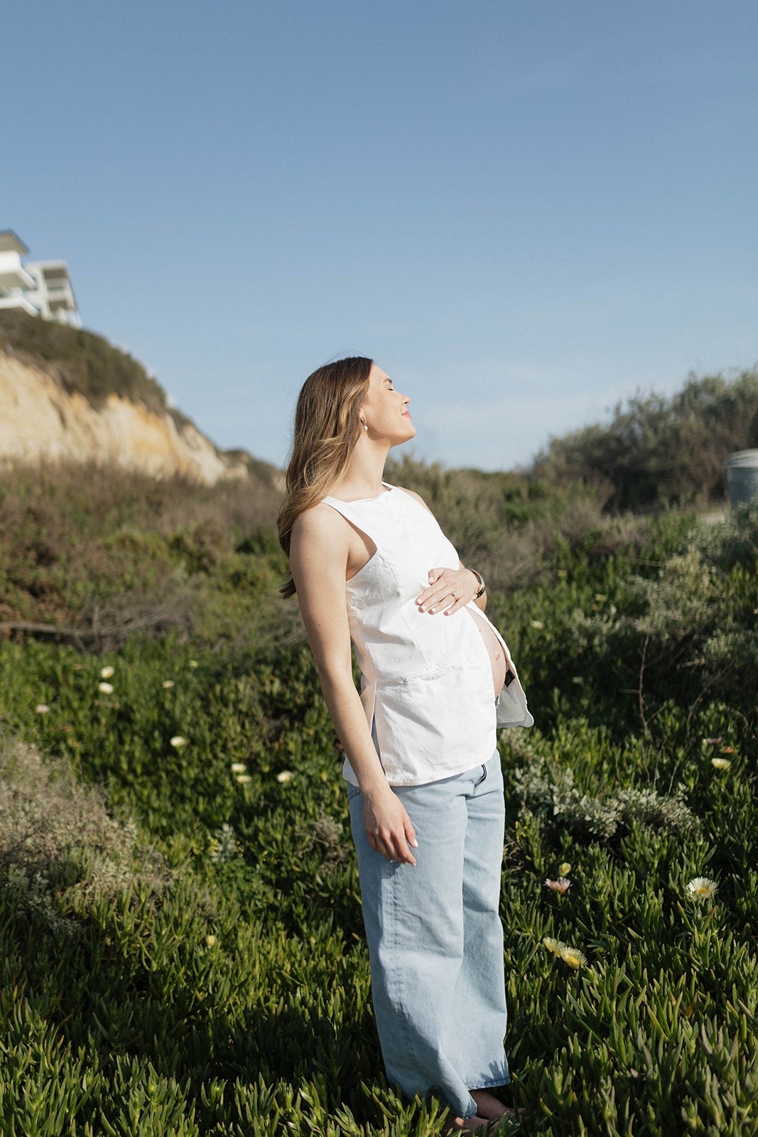 rent the runway for the win! obsessed with this outfit for my maternity pictures! #maternity #bunpfriendly #pregnancy #lowrise #jeans #vest #photos 

#LTKBump