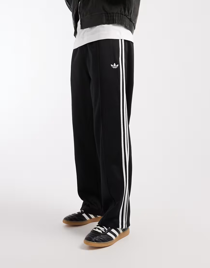 adidas Originals Baggy track pants in black / white | ASOS (Global)