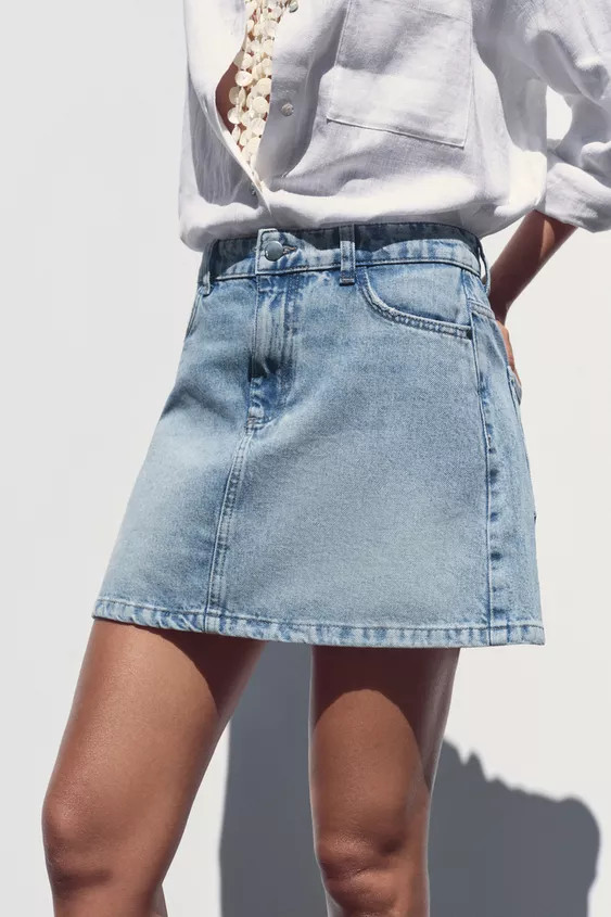 Five-pocket skirt. Faded effect. Front zip and metal button fastening. | Zara US