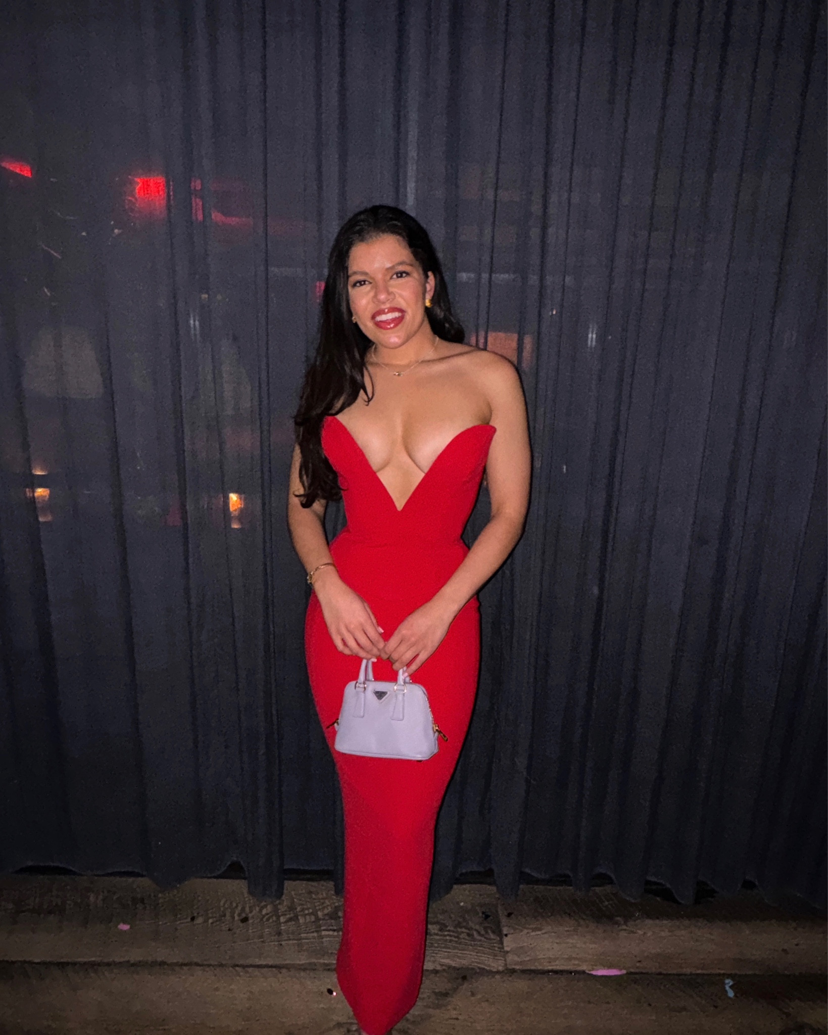 gorgeous jessica rabbit vibes! red set that looks like a dress with a deeeeep v. paired with purple purse and shoes

#LTKwedding #LTKparties #LTKSeasonal