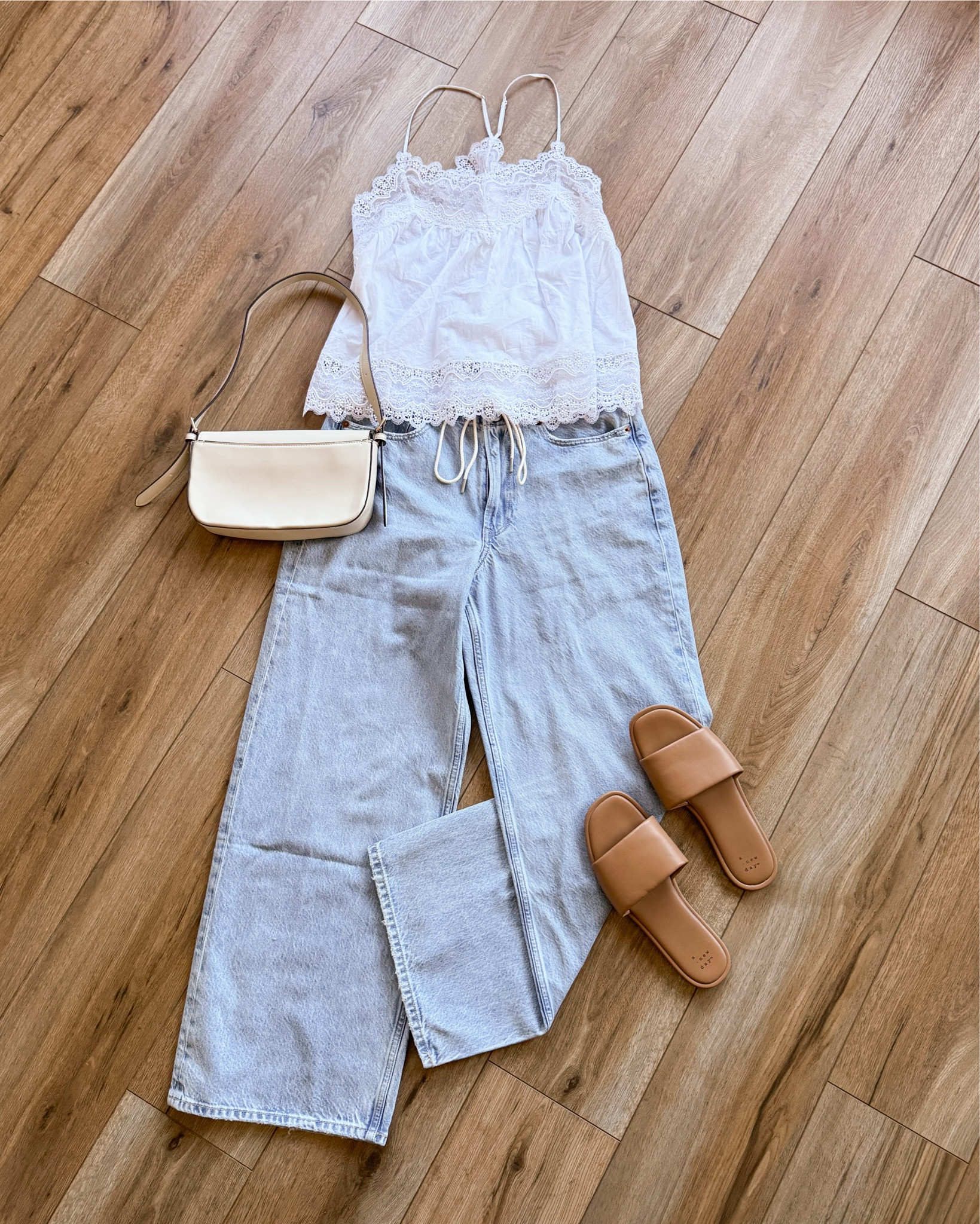 i was so surprised how much i loved these low rise baggy jeans! they run a little big, but sit just below the belly button with a functional drawstring. the denim material is light weight and they are just so cute and fun! 

#LTKSaleAlert #LTKSpringSale #LTKootd