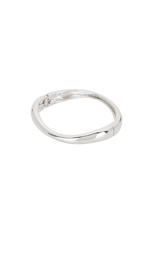 petit moments Lilly Bangle in Metallic Silver. | Revolve Clothing (Global)