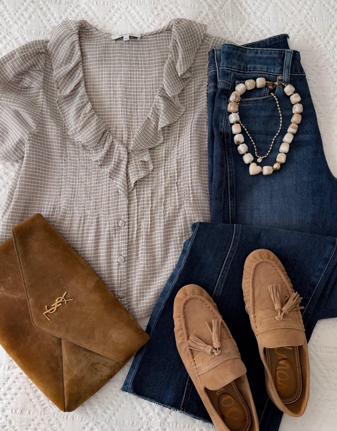 This is such a pretty way to transition denim into fall without jumping straight into sweaters. The soft plaid blouse, dark wash jeans, suede loafers, and brown accessories bring in those warmer fall tones while still feeling lightweight.

plaid blouse, dark wash jeans, fall outfit idea, suede loafers, brown accessories, transitional outfit, casual fall style, fall denim outfit, ruffle blouse, early fall outfit, annabrstyle

#LTKootd #LTKSeasonal #LTKOver40