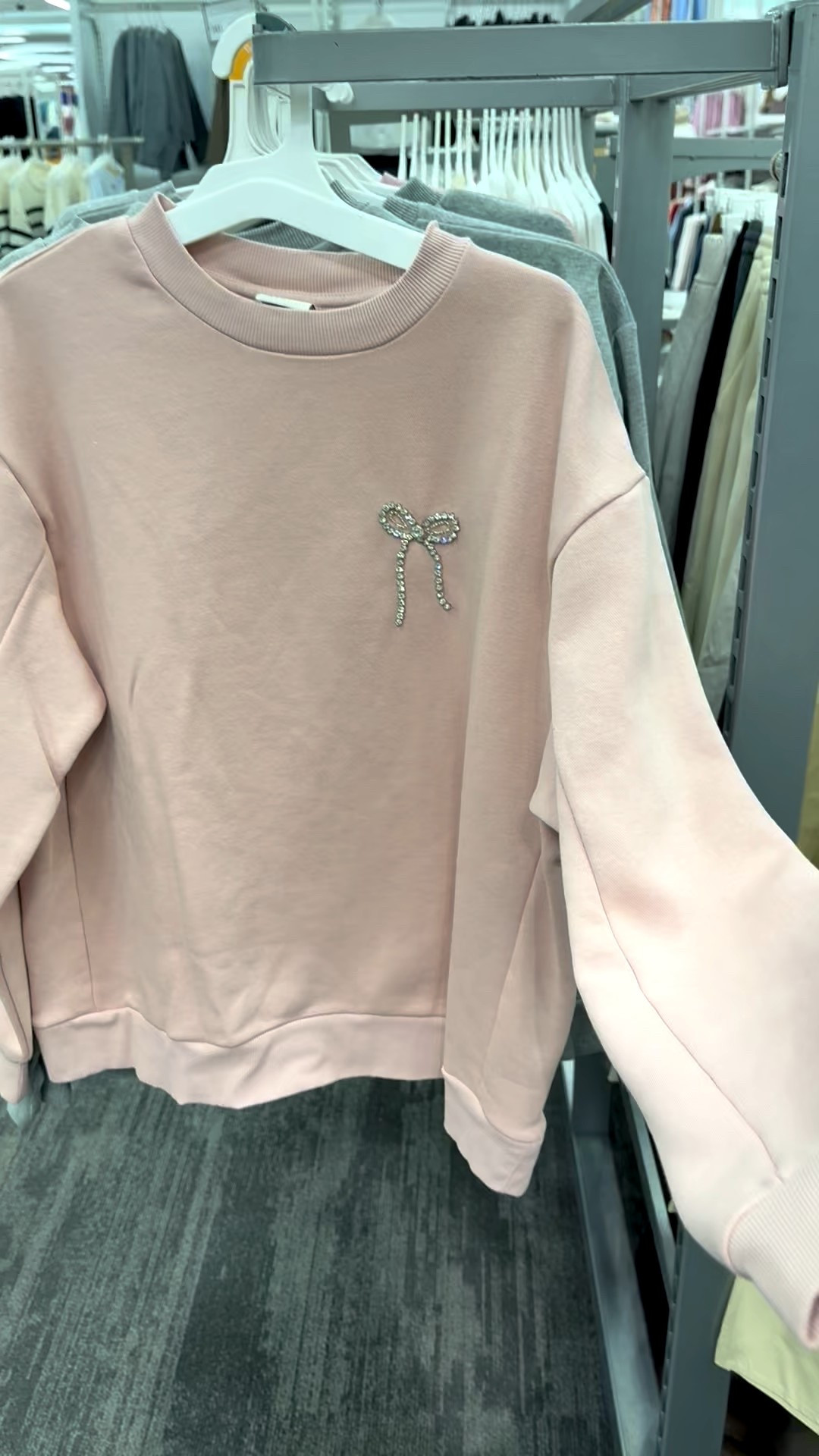 This sweatshirt is adorable, and perfect for a low-key NYE look! Wear it with jeans, dressy pants, or a skirt. Very flexible! It comes in two colors — this is the pink — and has an adorable rhinestone bow. This is a warm one and has fleece lining, round neck and ribbed cuffs and hem.

#bowsweatshirt #dressysweatshirt #newyearseve #NYE #nyefit #nyetop #warmnyetop #bowdetail #Target #anewday #rhinestonebow #newyearsevepartylook

#LTKootd #LTKFindsUnder50 #LTKHoliday