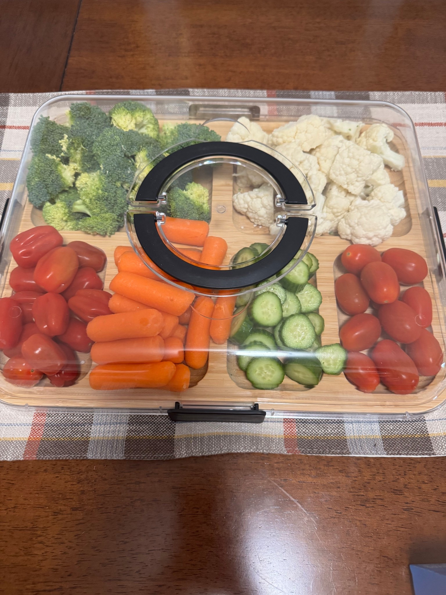Party veggie tray! It can be used for many different things but the carry on lid comes in handy!

#LTKHome #LTKfoodie #LTKvlog