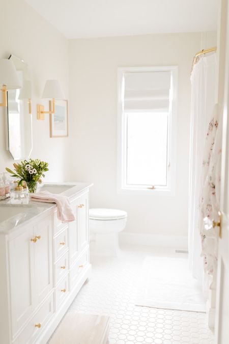 Create a spa bathroom with brass hardware, a new white marble vanity, bathroom towels and more decorations! Bathroom decor, bathroom furniture, bathroom, soa bathroom, home decor, home furniture.

#LTKSeasonal #LTKhome #LTKstyletip