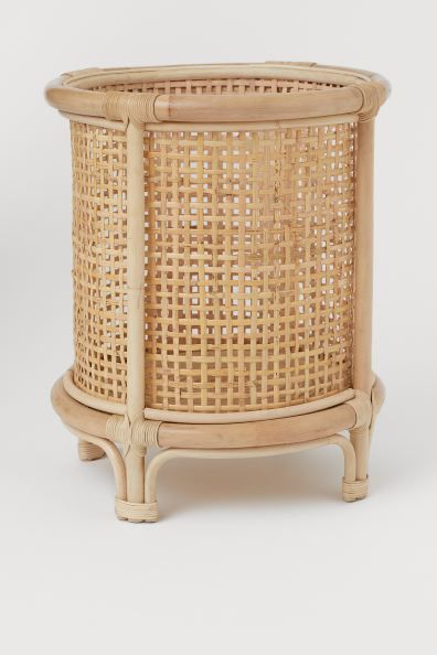 Large plant pot in braided rattan with a fixed frame on legs. Diameter 25 cm, height 37 cm. | H&M (UK, MY, IN, SG, PH, TW, HK)