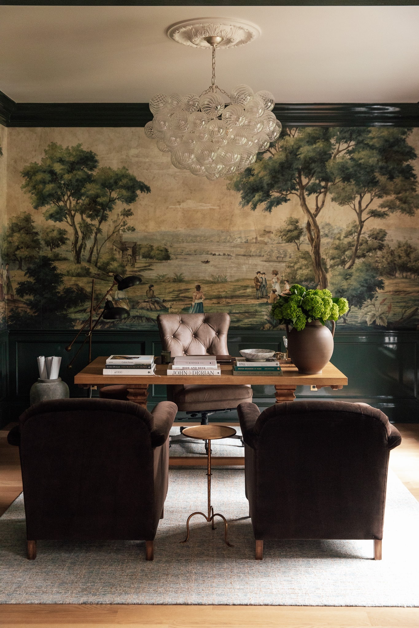 We have two desks on our first floor, one in the study and one in the kitchen. There’s a deep dive on how we use each one on ChrisLovesJulia.com today!

Mural, bubble chandelier, leather desk chair, trestle dining table, arm chairs, coffee table books, brass drink table

#LTKfamily #LTKhome