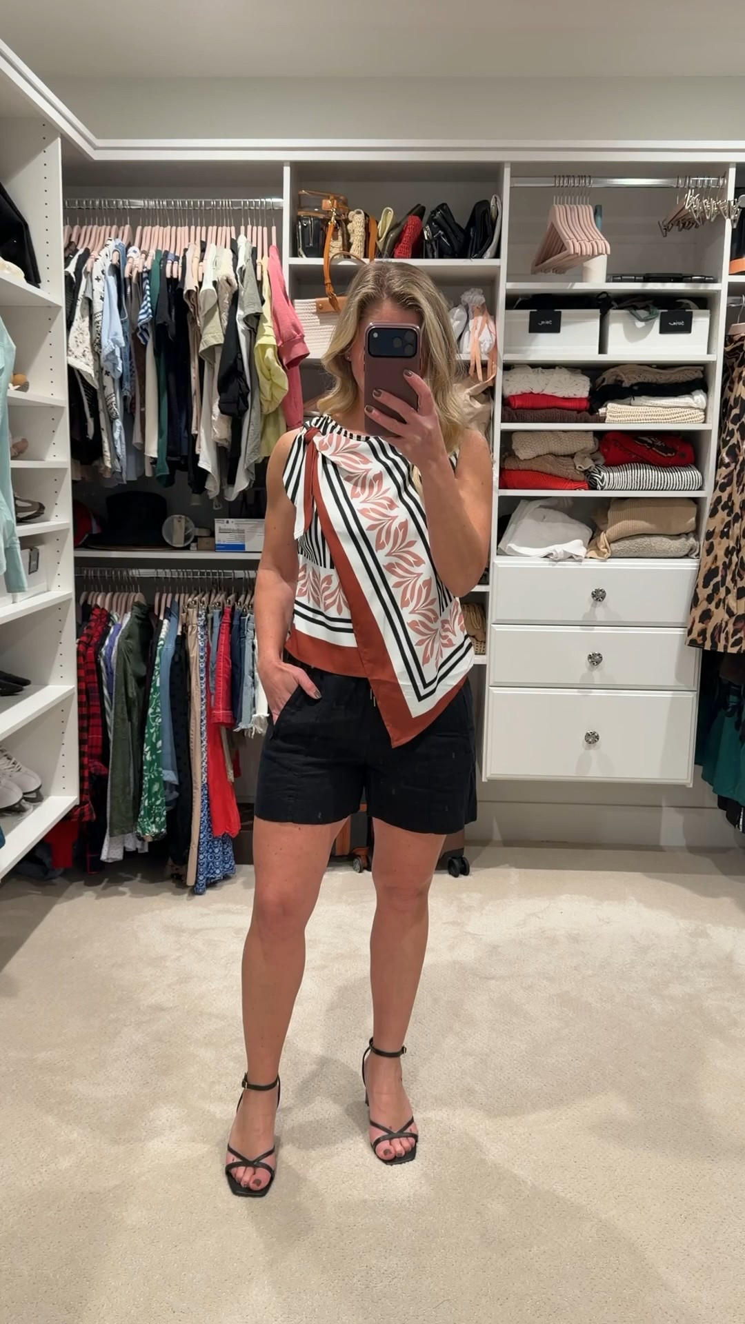 Summer vacation look, but make it chic ☀️
I’m loving this scarf top moment paired with easy linen shorts and barely-there strappy heel sandals. It’s that perfect balance of relaxed and polished, breathable fabrics with a little structure from the heels.

Style tip: scarf tops are amazing for travel because they pack small and instantly elevate a simple short or trouser. Keep the rest neutral and let the print do the talking, then finish with delicate sandals for sunset dinners or cocktails by the beach.

Effortless, airy, and ready for warm nights away 🌴

#LTKPetite #LTKootd #LTKTravel