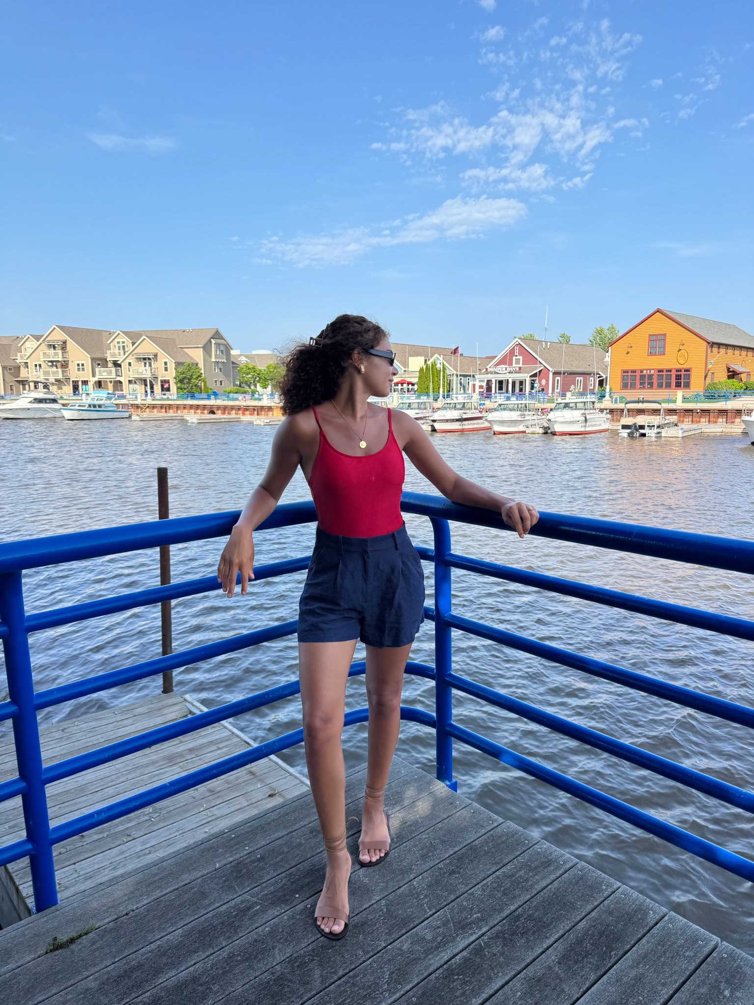 Boardwalk summer outfit: red one piece swimsuit, navy blue shorts, strappy sandals 

#LTKSwim #LTKSeasonal