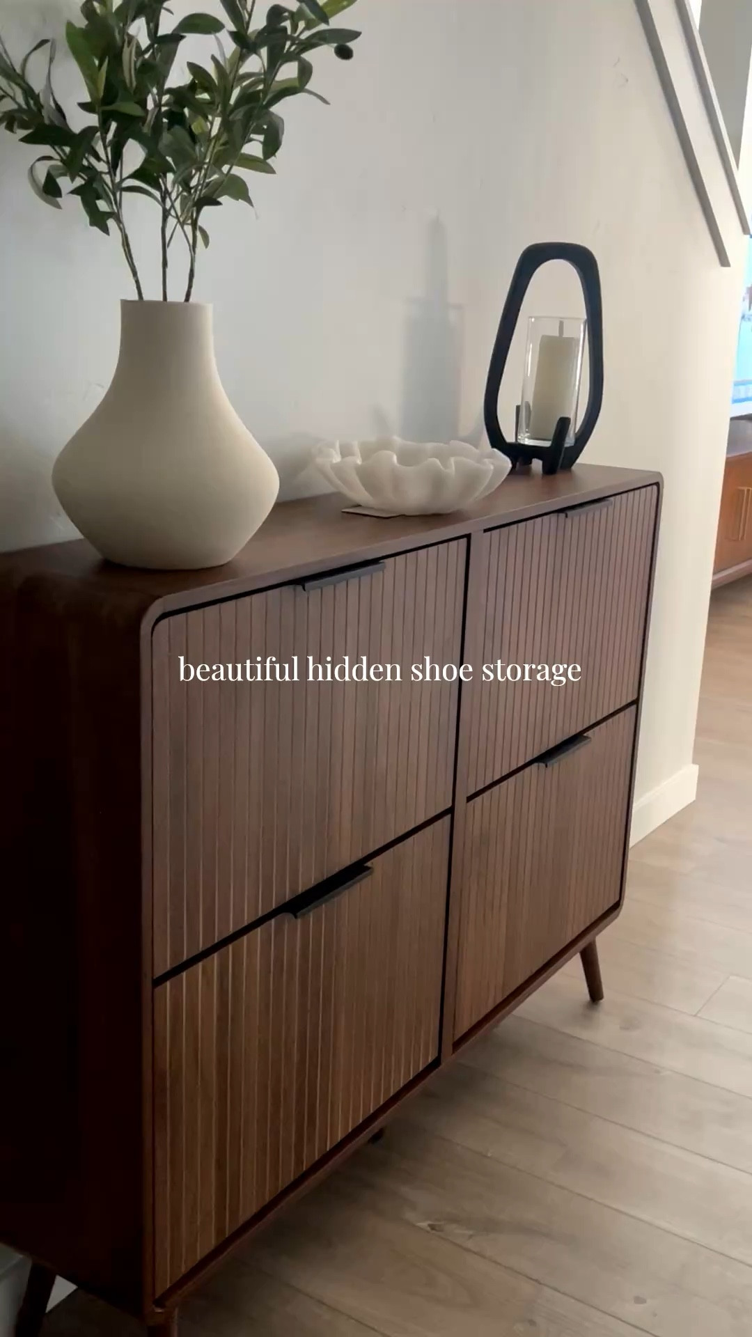 We searched everywhere for a slim, aesthetic shoe storage cabinet that would fit in our hallway without taking up too much space, and found this beautiful, modern shoe cabinet on Amazon!

Shoe storage cabinet, hidden shoe storage, hallway cabinet, slim cabinet, Amazon, Amazon home

#LTKhome