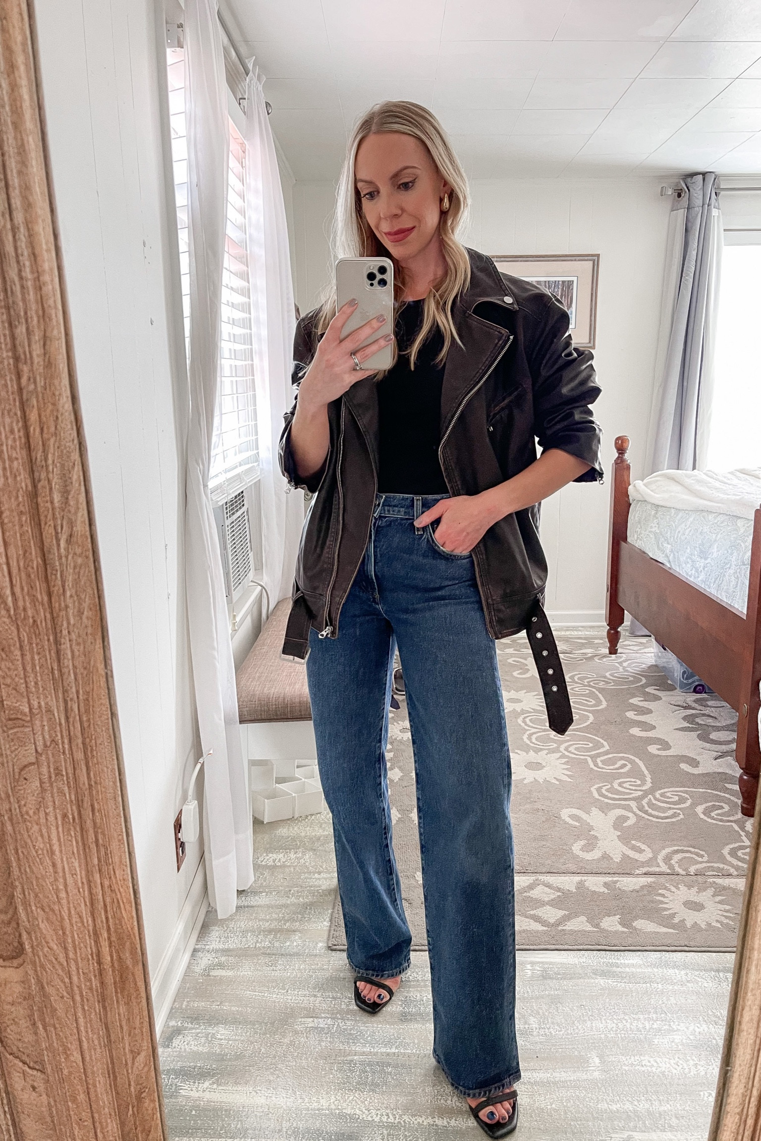 Oversized faux leather moto jacket, wide leg jeans, fall outfit, minimal style, date night 

#LTKover40 #LTKSeasonal #LTKstyletip