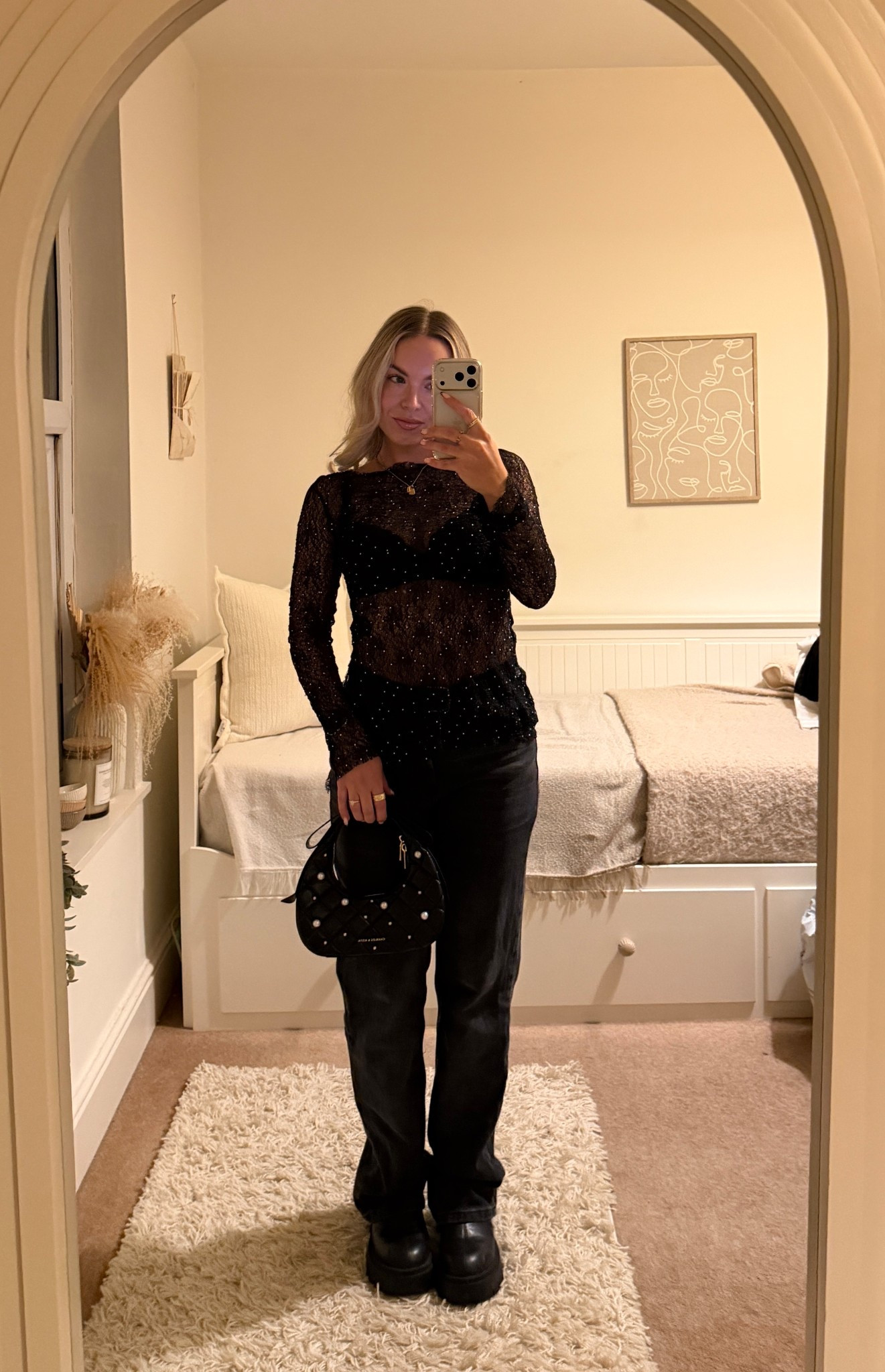 A lil festive look ✨🖤

Black lace top with rhinestones
Black straight leg jeans 
Black chunky boots 
Black bow pearl bag

#LTKfestive #LTKbag #LTKuk