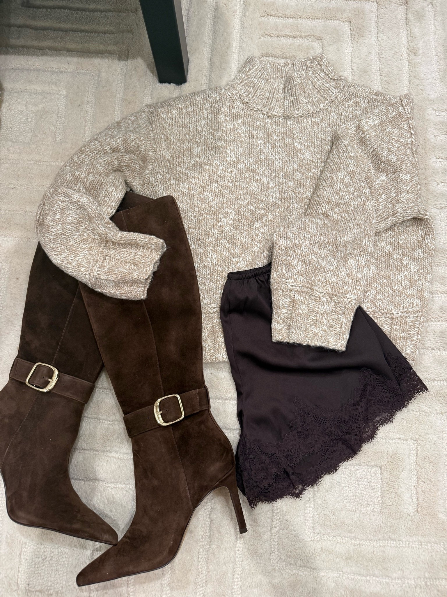 Neutral knit sweater with lace trim satin shorts and brown suede boots 
Fall outfit idea