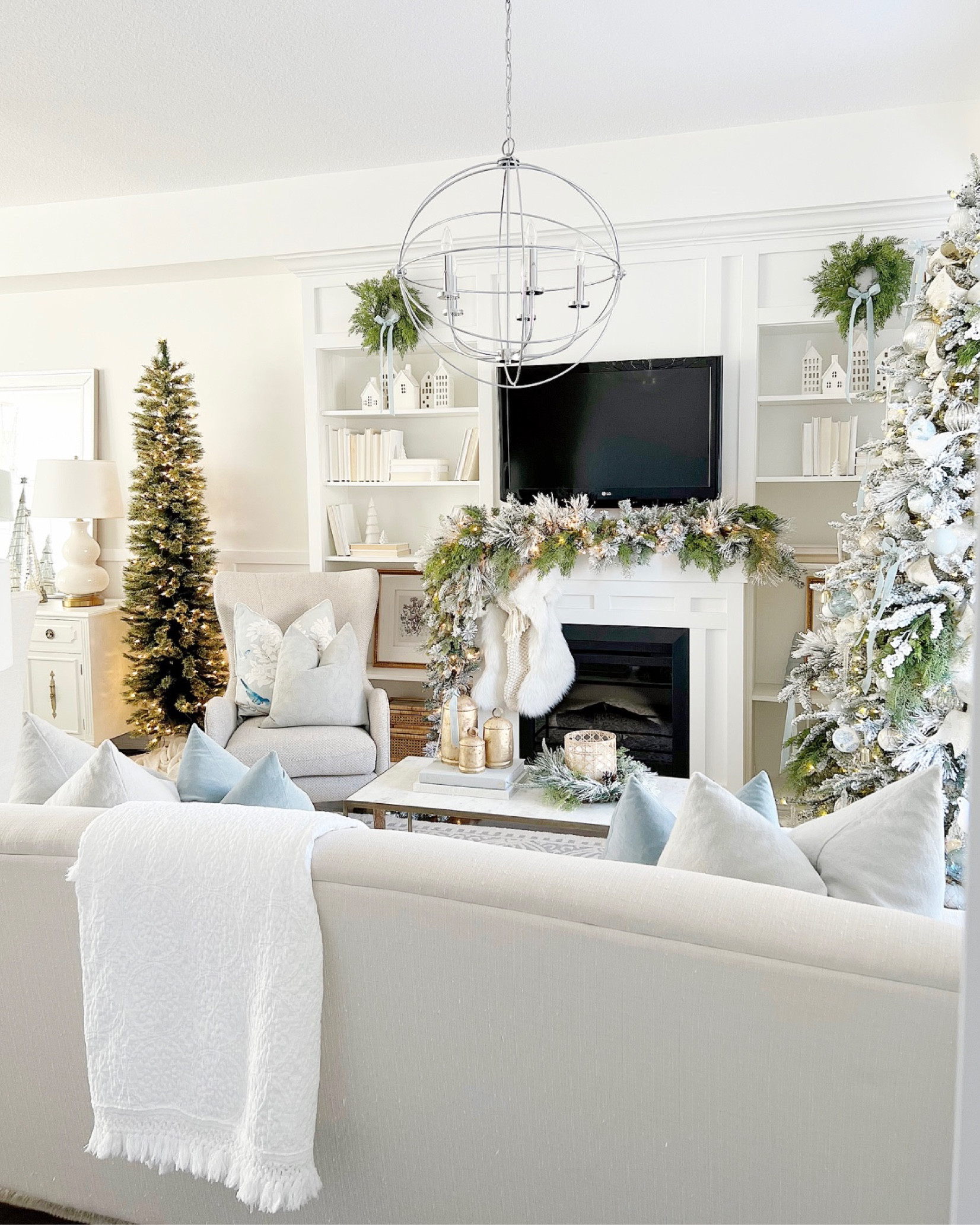 Christmas living room. Flocked tree. Holiday decor  

#LTKsalealert #LTKHoliday #LTKhome