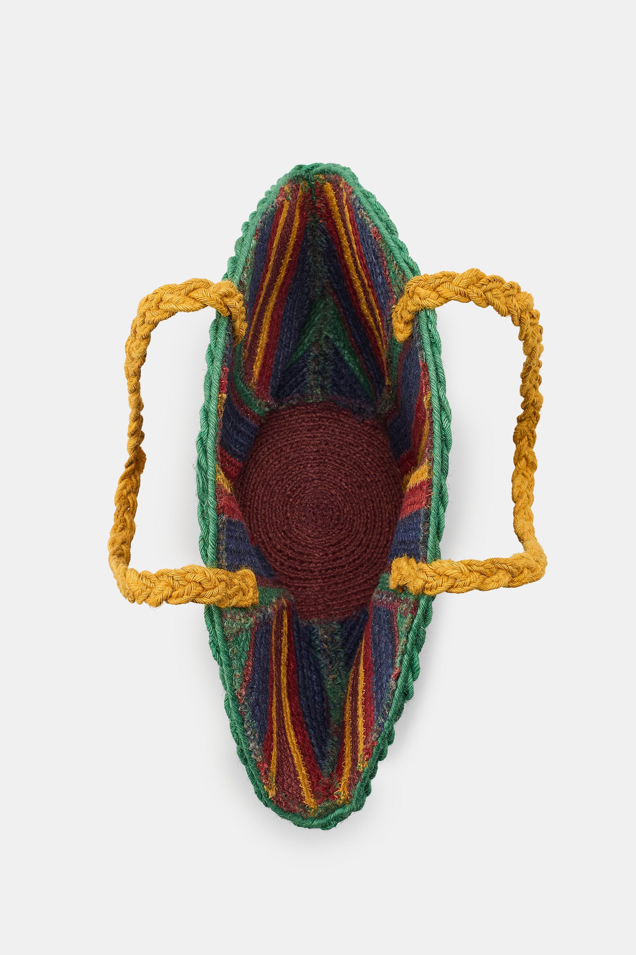 Bag with main fabric made of 100% jute. Braided fabric detail. Shoulder straps. | Zara US