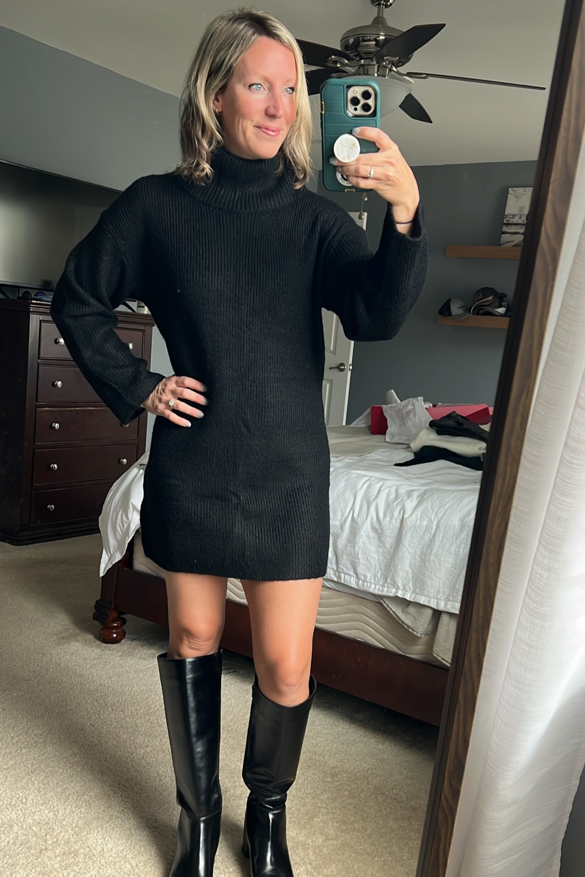 This sweater dress is so comfy and so versatile. Perfect for all of your fall and winter festivities!