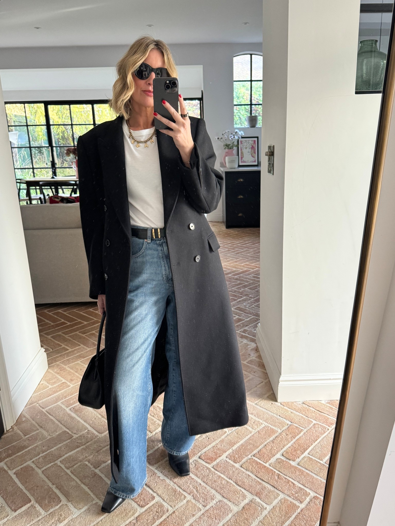 A Chanel Inspired Outfit | long tailored coat - blue jeans - Boots 

#LTKwinter #LTKstyletip #LTKdatenight