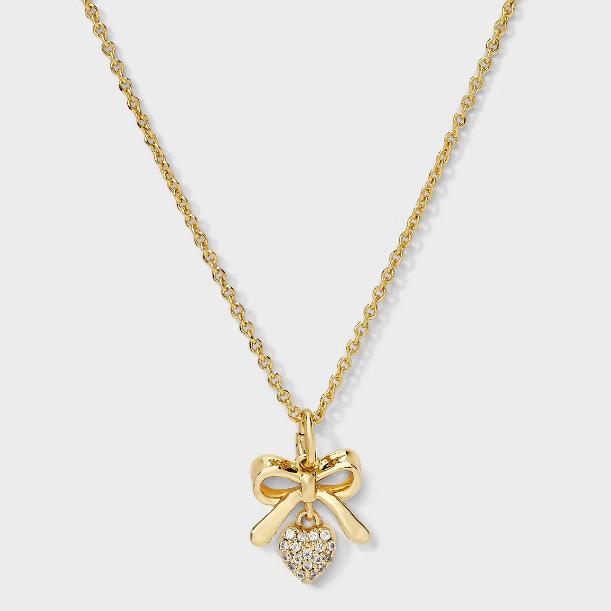 14K Gold Dipped Cubic Zirconia Bow and Heart Pendant Necklace - A New Day™ Gold | Target