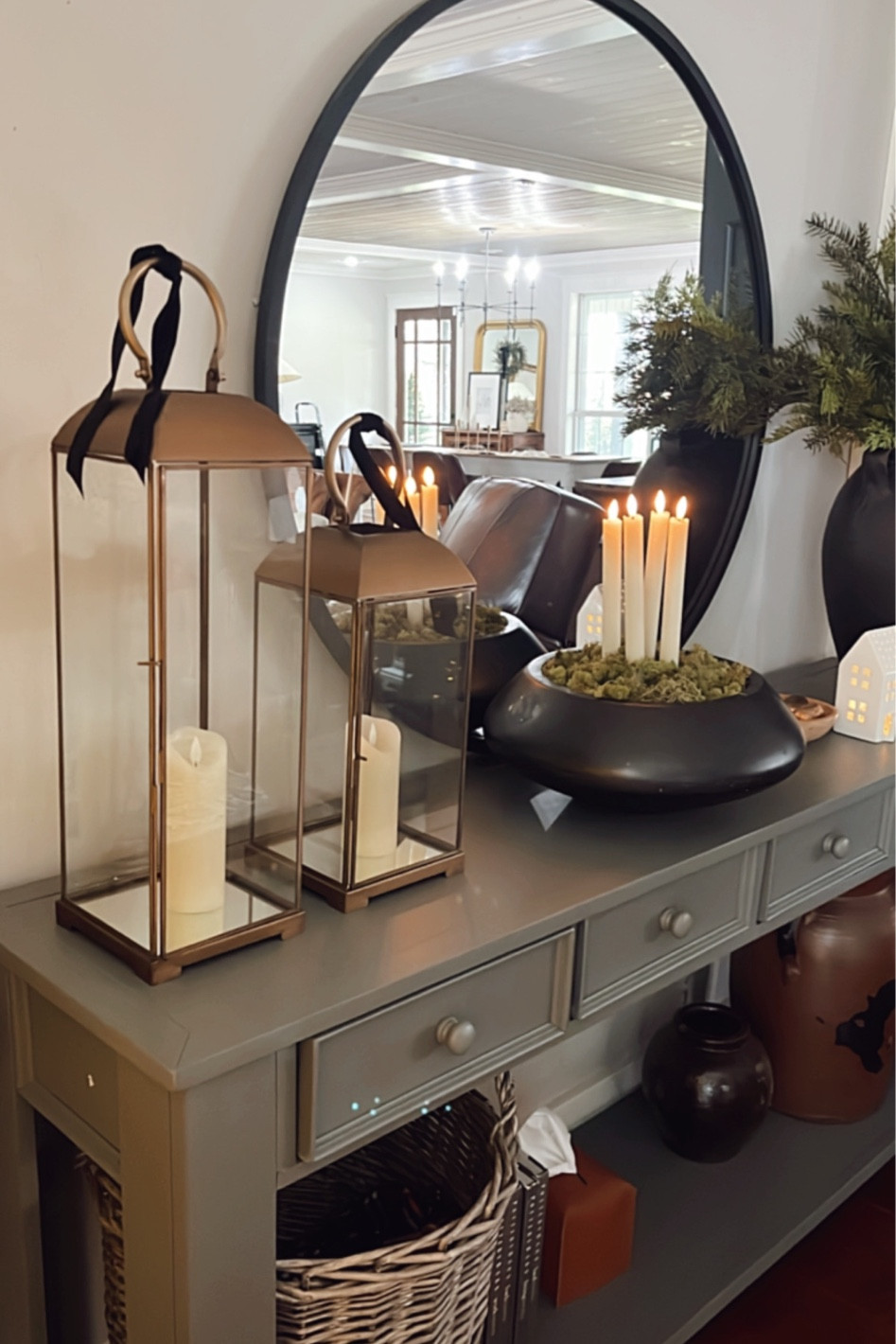 Holiday home decor! Lanterns from world market, mirror from Amazon, and a DIY table centerpiece with candles from Amazon! 

#LTKhome #LTKHoliday