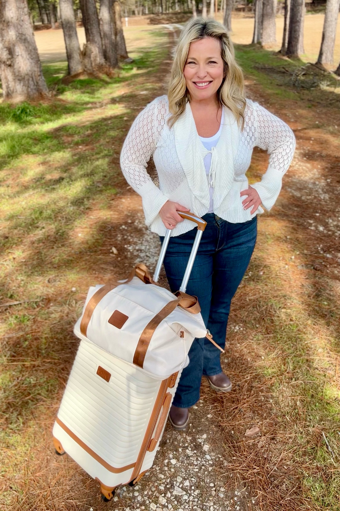Great travel outfit and luggage set. I am in a 12 petite in the jeans and a medium in the sweater. Luggage that also comes with a backpack variation. #travel 

#LTKOver40 #LTKTravel #LTKPetite