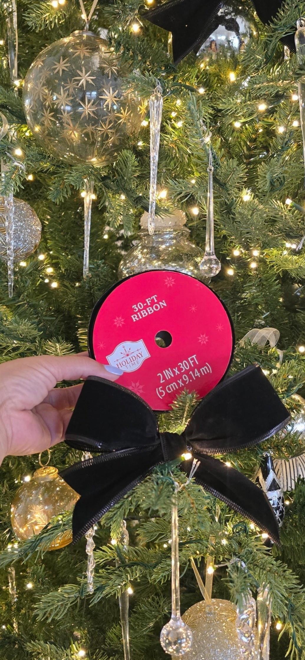 Under $6 Velvet Ribbon for Luxe Christmas Bows (30ft)This is the velvet ribbon I used for all my black bows this year.It looks luxe on the tree, even though the back feels a little plasticky — but that’s exactly why it holds its shape so well.If you want bows that stay put and look expensive without the price tag, this ribbon is perfect.#HolidayDecor #ChristmasTreeDecor #VelvetRibbon #BlackVelvetBow #HolidayStyling #LTKHoliday #LTKHome #LTKSeasonal #ChristmasDIY #HolidayInspo #ChristmasTreeIdeas #WalmartFinds #AffordableHolidayDecor

#LTKHome #LTKHoliday #LTKSeasonal