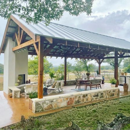 #MakeoverMonday - We took a rundown shed and had it rebuilt into this incredible outdoor pavilion! 🙌🏻 We then added a fireplace, kitchen, lighting, and multiple seating areas to maximize this space. Now our clients can take in their #TexasHillCountry views in STYLE! 🔨Big thanks to @wimberleyrestoration for partnering with us on this project! Check out the before pics on insta and Facebook!
#WoodlandsStyleHouse #WoodlandsStyleHouseATX

#LTKhome #LTKunder50 #LTKSeasonal
