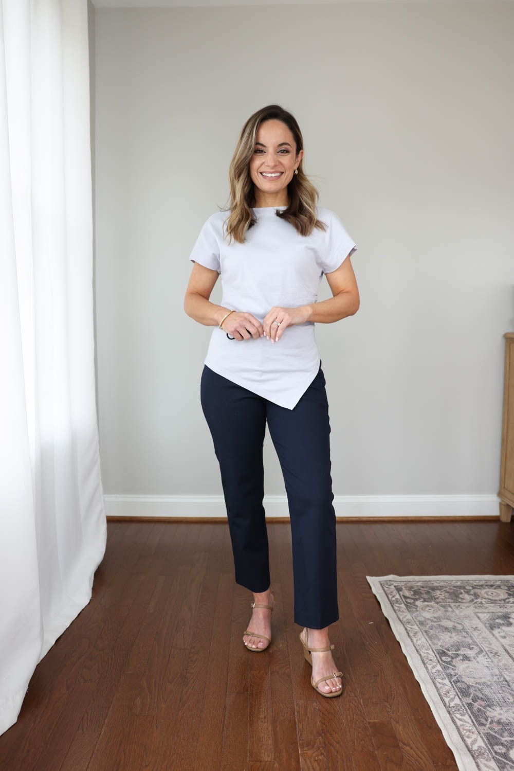 3 petite friendly pants you can wear to work! 
 
Eva Pants (Ann Taylor): petite 0 in standard (curvy is true to size for me, petite 00) | 9” rise | 25” inseam 

Purple top (Nordstrom): xxs - link shows top in black 

Wedges (LOFT): true to size - straps are snug 

My measurements for reference: I’m 4’10” and 105lbs. My bust, waist, and hip measurement is 32”, 24”, and 36”.