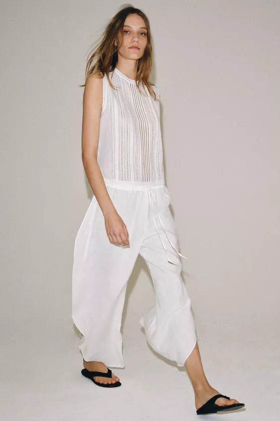 ZARA WOMAN COLLECTIONBlouse with main fabric made of cotton yarn. Round neck and sleeveless. Tona... | Zara US