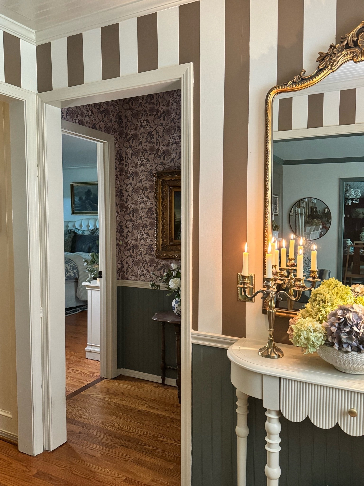 Loving the floral peel and stick wallpaper that I added to this small transition space off of the entryway.

#LTKSeasonal #LTKHome #LTKSaleAlert